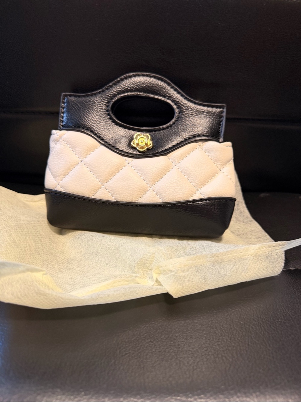 Chic Black and Cream Quilted Mini Top-Handle Bag
